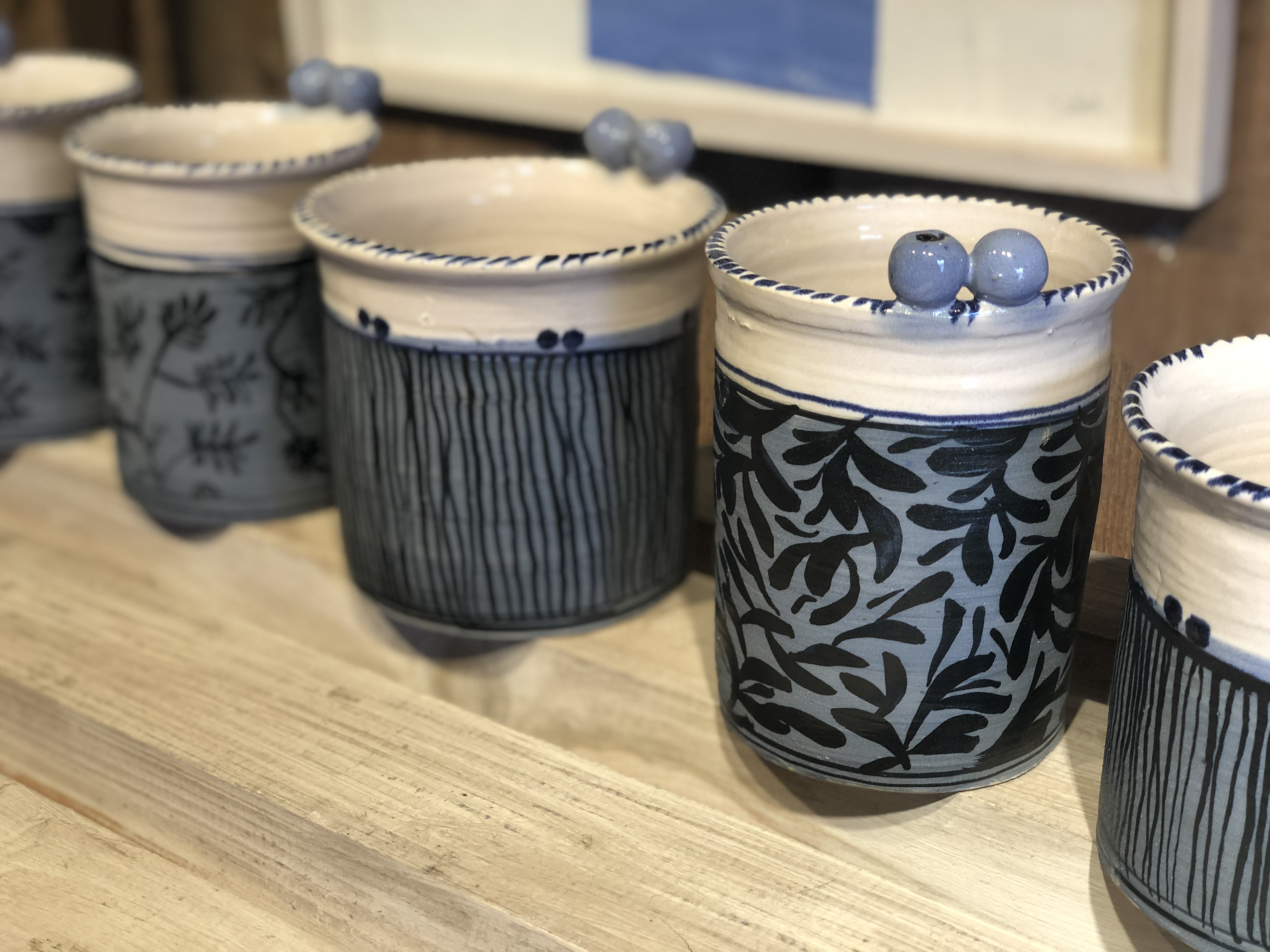 Blå cylinderformad keramik